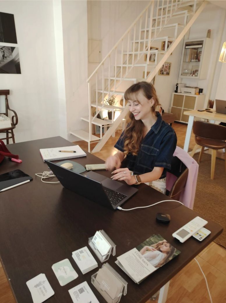 Alicia at her desk